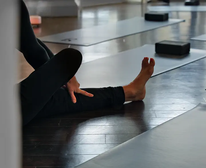 Yoga Instructor Stretching