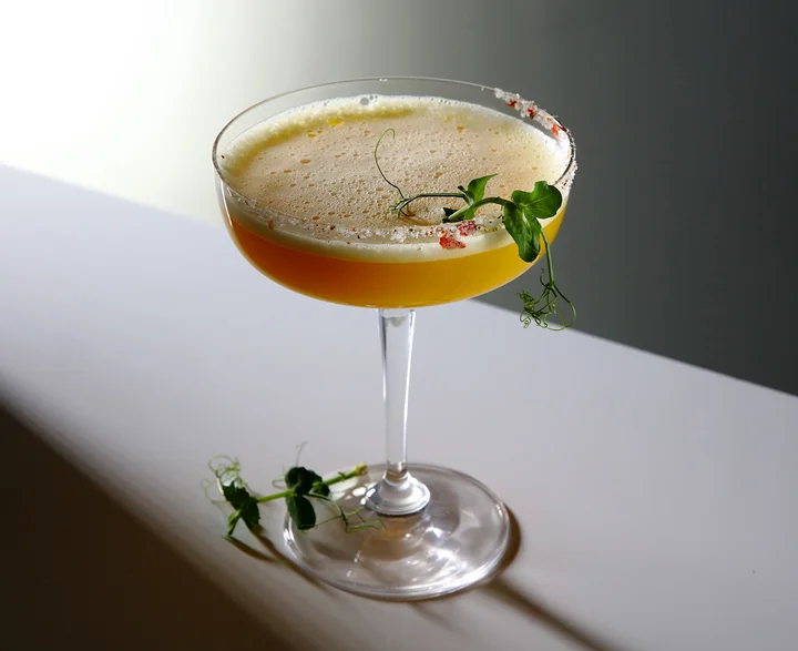 The Fire drink served in a cocktail glass.