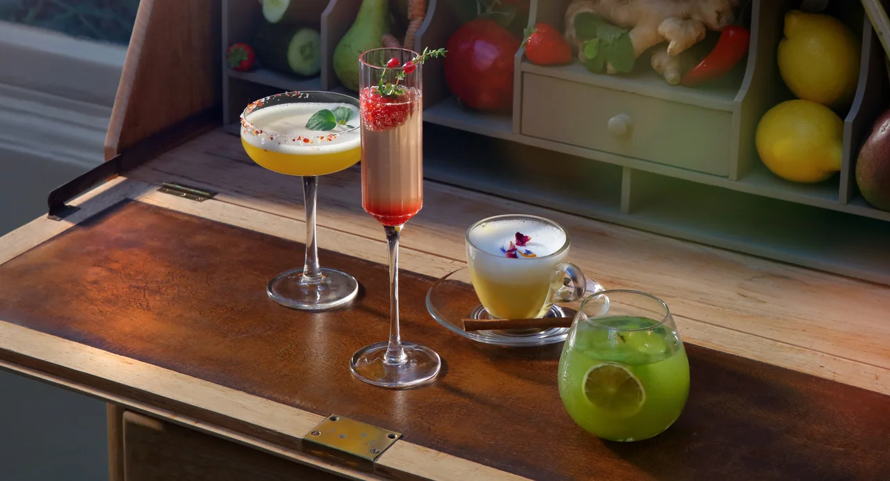 Four Free Spirit drinks — Earth, Fire, Ether and Air — served in cocktail glasses.